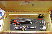 Two RC helicopters in transport box