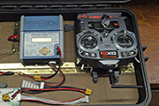 Random Heli Skid Camps used to secure RC radio transmitter in charger case